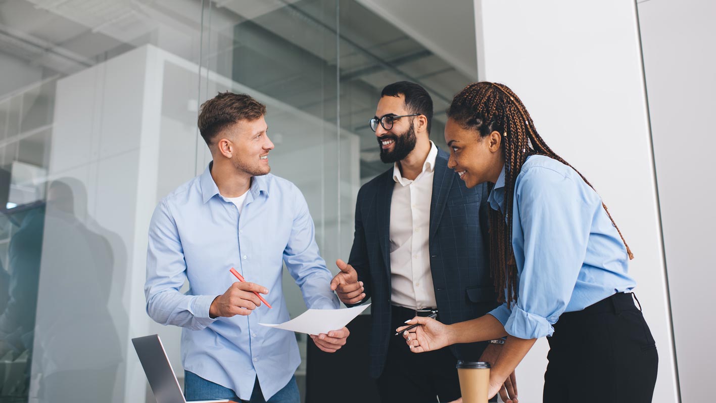 A group of people in a meeting