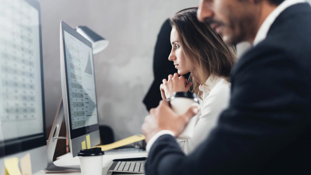 People doing online training on computer