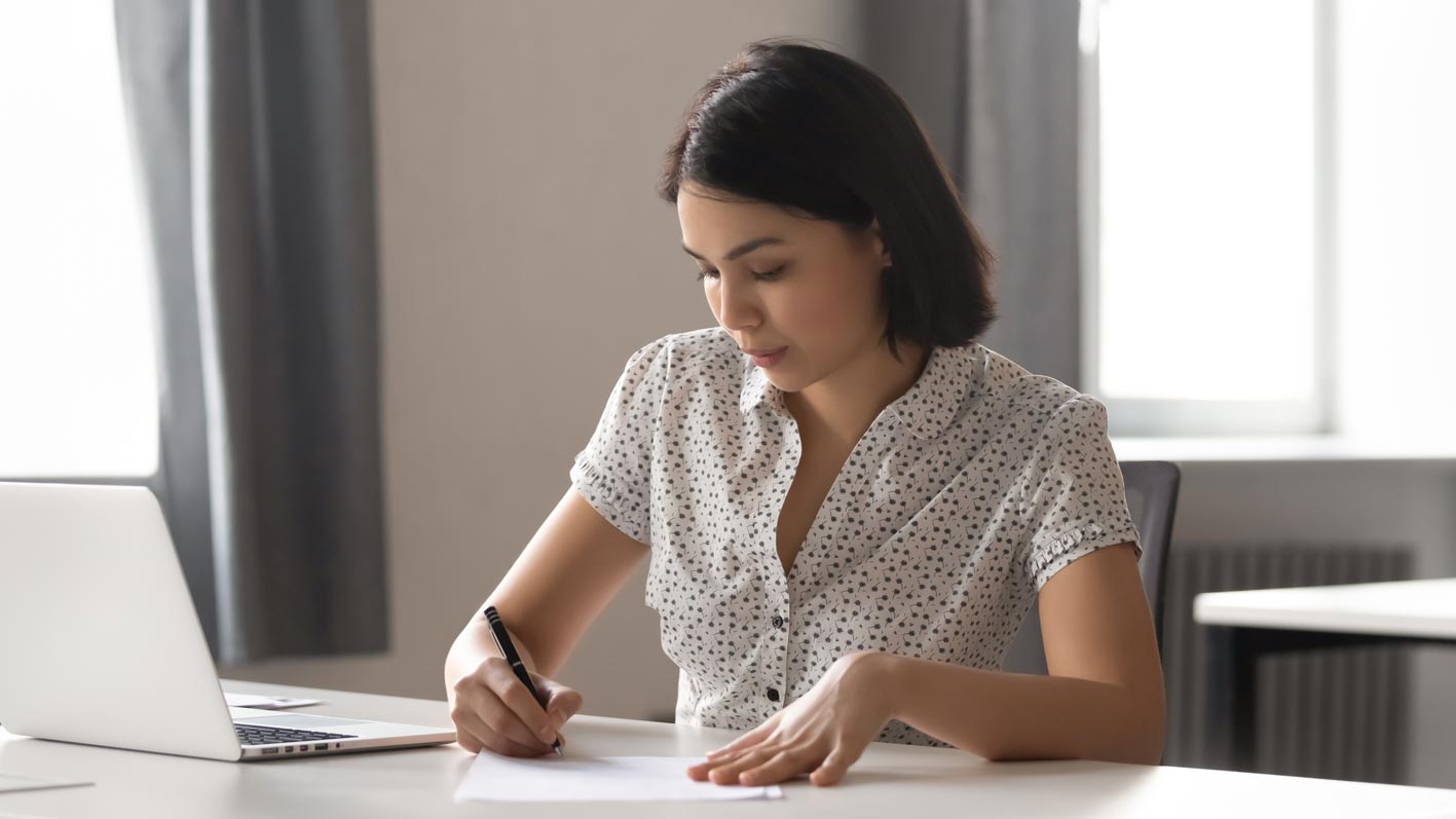 Woman learning on laptop