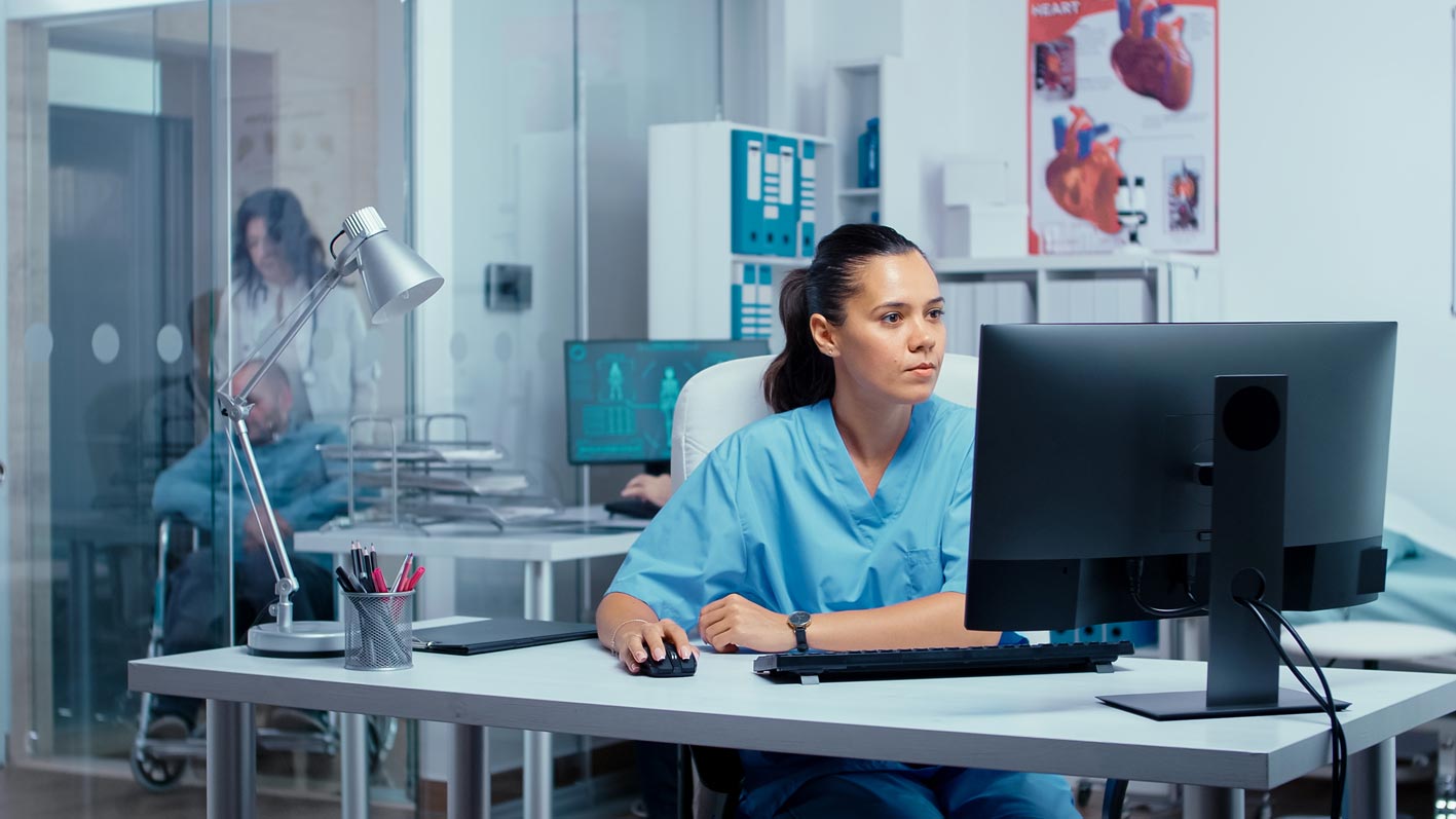 Nurse using computer