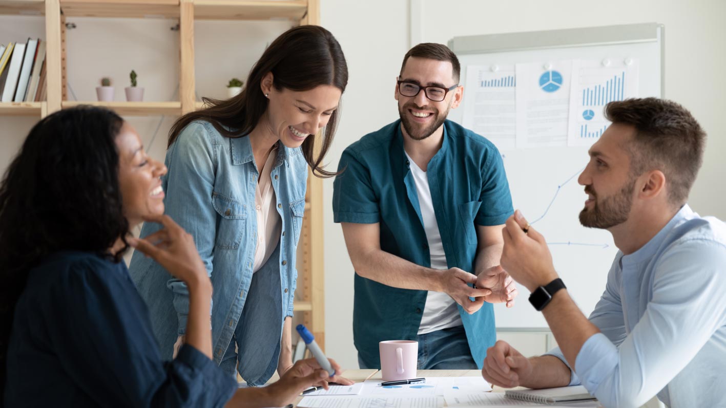 A group of people in a team meeting