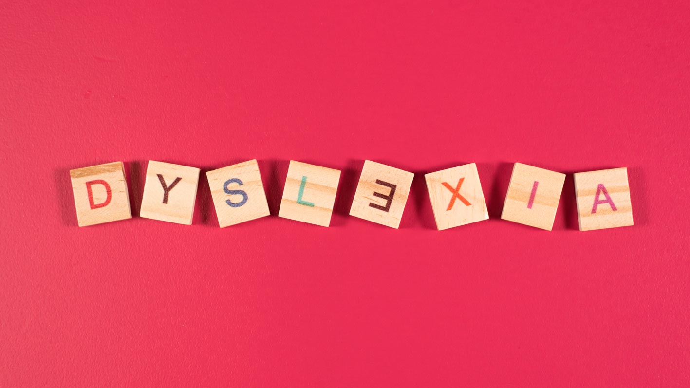 wooden alphabet blocks with DYSLEXIA word