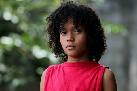 Serious,Child,Standing,Outside,Looking,At,Camera.,Brazilian,Black,Girl