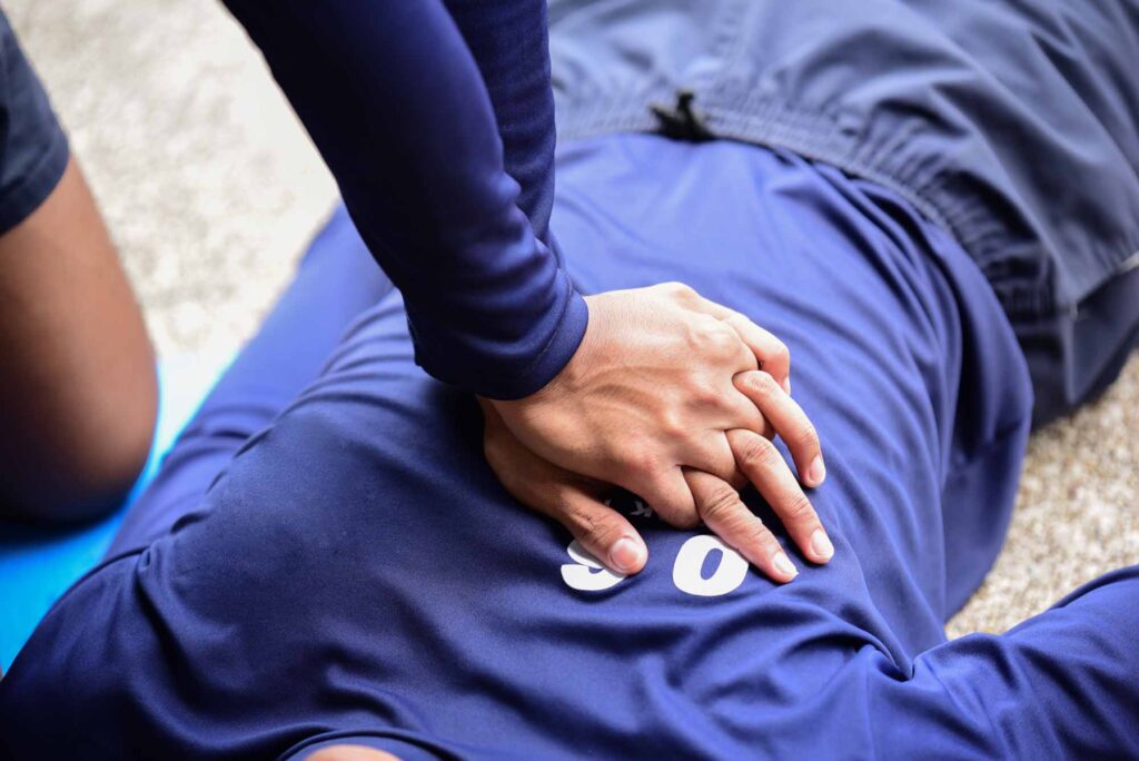 Person doing CPR training