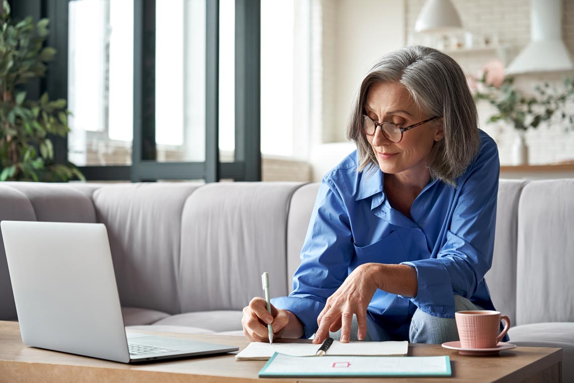 Woman learning on laptop