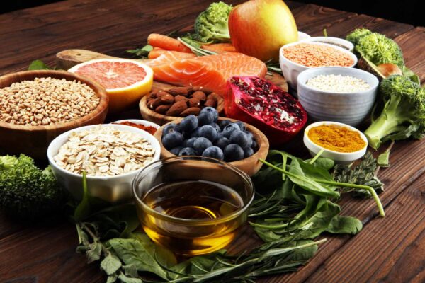 A layout of fish, fruit, vegetable, cereal, and vegetables