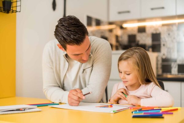 Little,Girl,And,Her,Father,Enjoy,Drawing,Together,At,Their