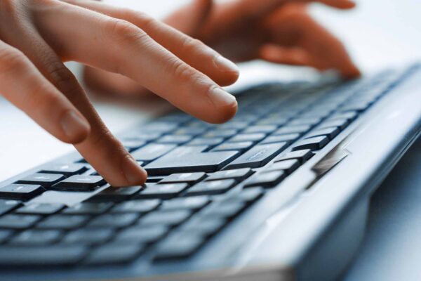 Image,Of,Man's,Hands,Typing.,Selective,Focus