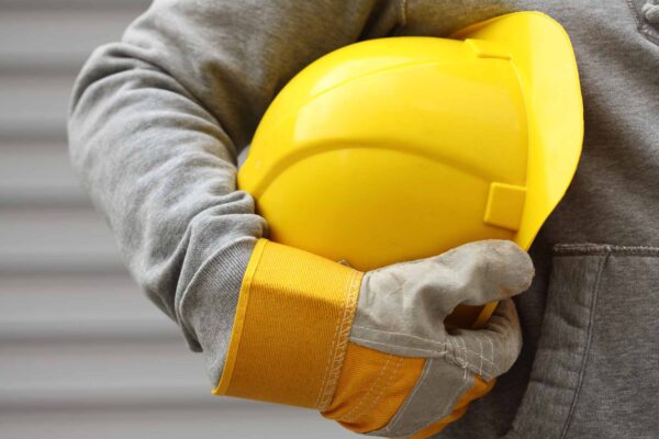 Man,Holding,Yellow,Helmet,Close,Up