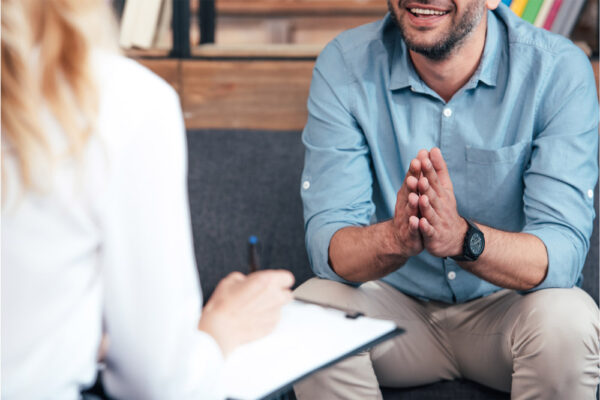 Man talking to woman