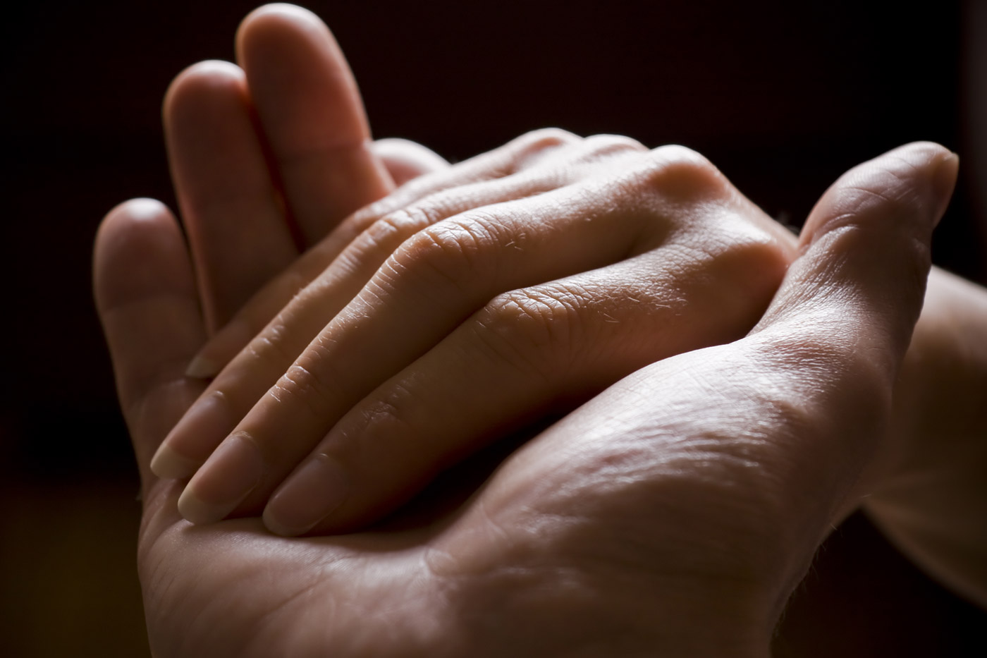 Man and woman hold each others hand