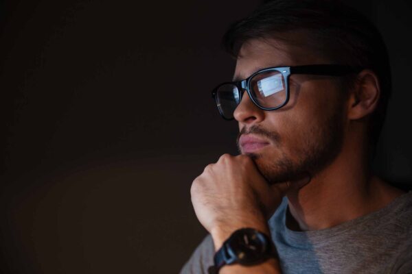 Closeup,Of,Serious,Focused,Handsome,Man,In,Glasses,Looking,At