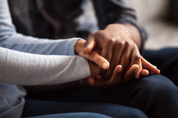 Close,Up,Black,Woman,And,Man,In,Love,Sitting,On