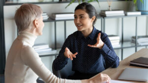 Two women talking