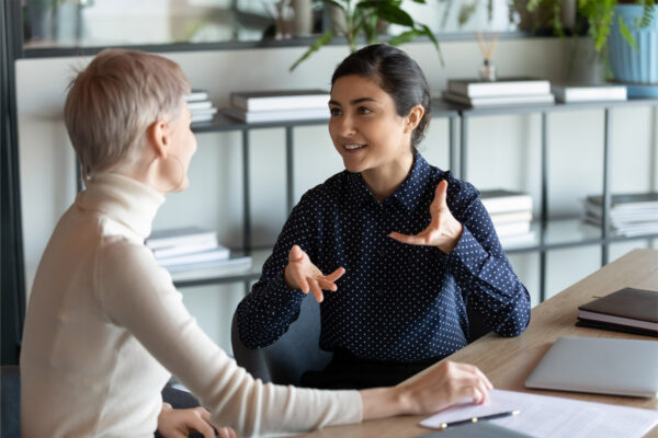 Two women talking