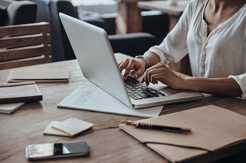 Woman doing training on laptop and building skills.