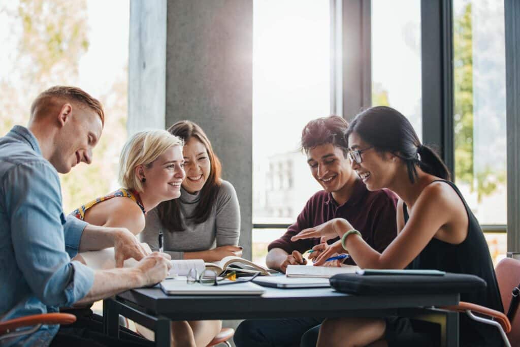 a group of students sitting at the desk