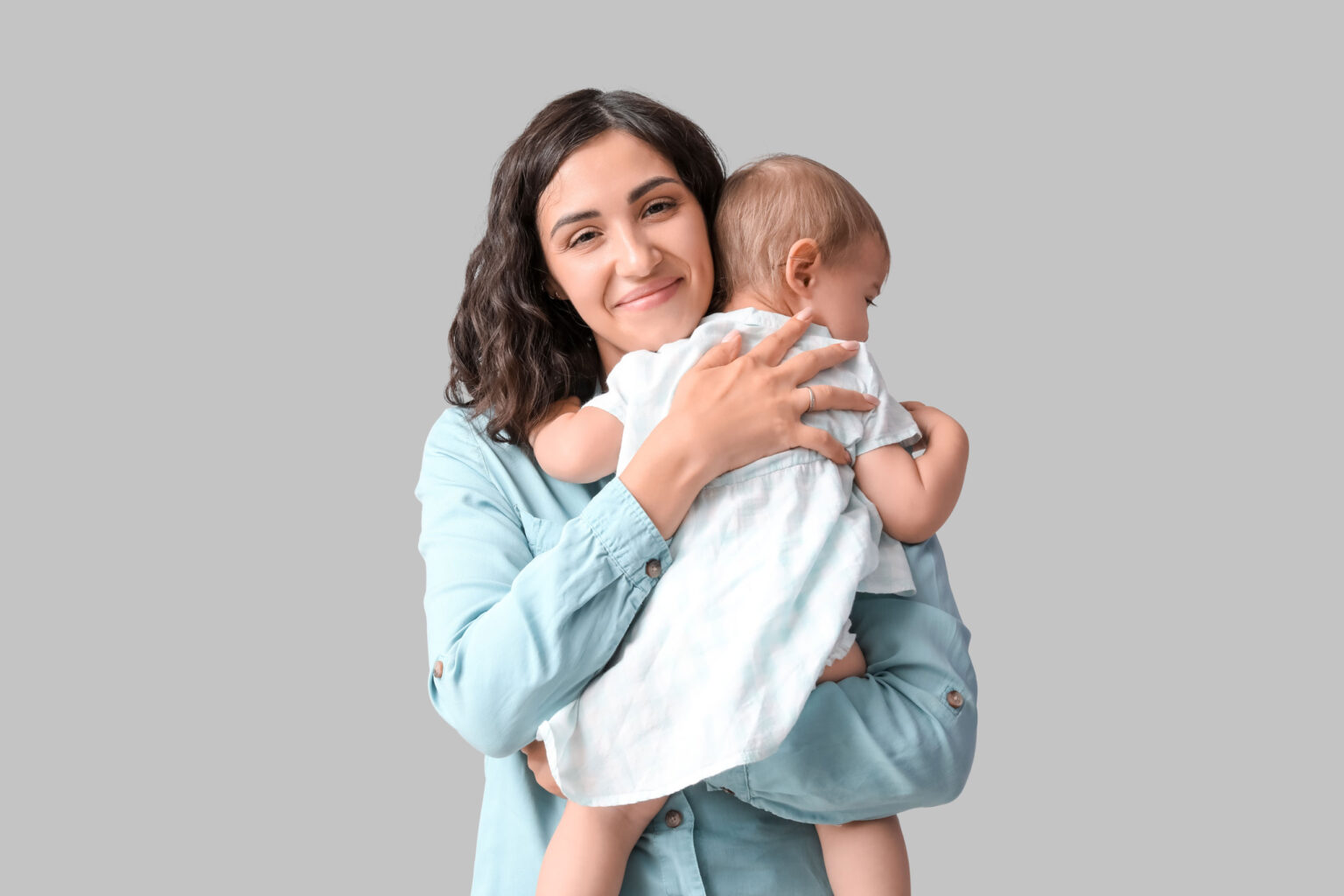 Photo of woman holding a baby