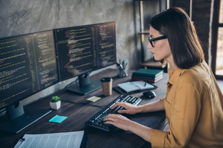 Woman on computer doing cyber security training